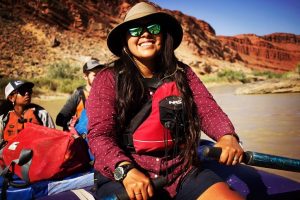 Noelle Kooyahoema sitting in a kayak depicts her as an Ancestral Lands Hopi field supervisor