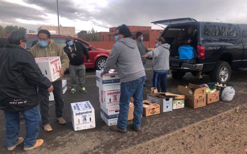 Hopi family food delivery in support of community leaders.